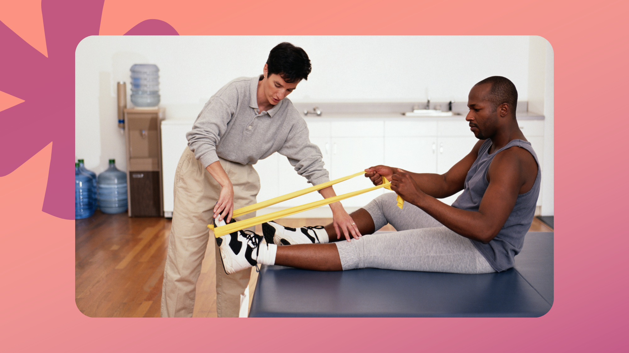 Physical therapist reviewing a patient PT intake form before a resistance band therapy session